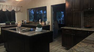 Fridge, microwave, stovetop, cookware/dishes/utensils