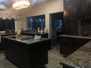 Fridge, microwave, stovetop, cookware/dishes/utensils