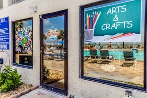 A building with a sign for 'Adventure Zone' and 'Arts & Crafts'. - The Summit by Forehand Rentals (Panama City Beach)