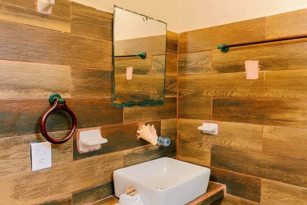 room, private bathroom, beach view | bathroom | shower, rainfall showerhead, towels, soap