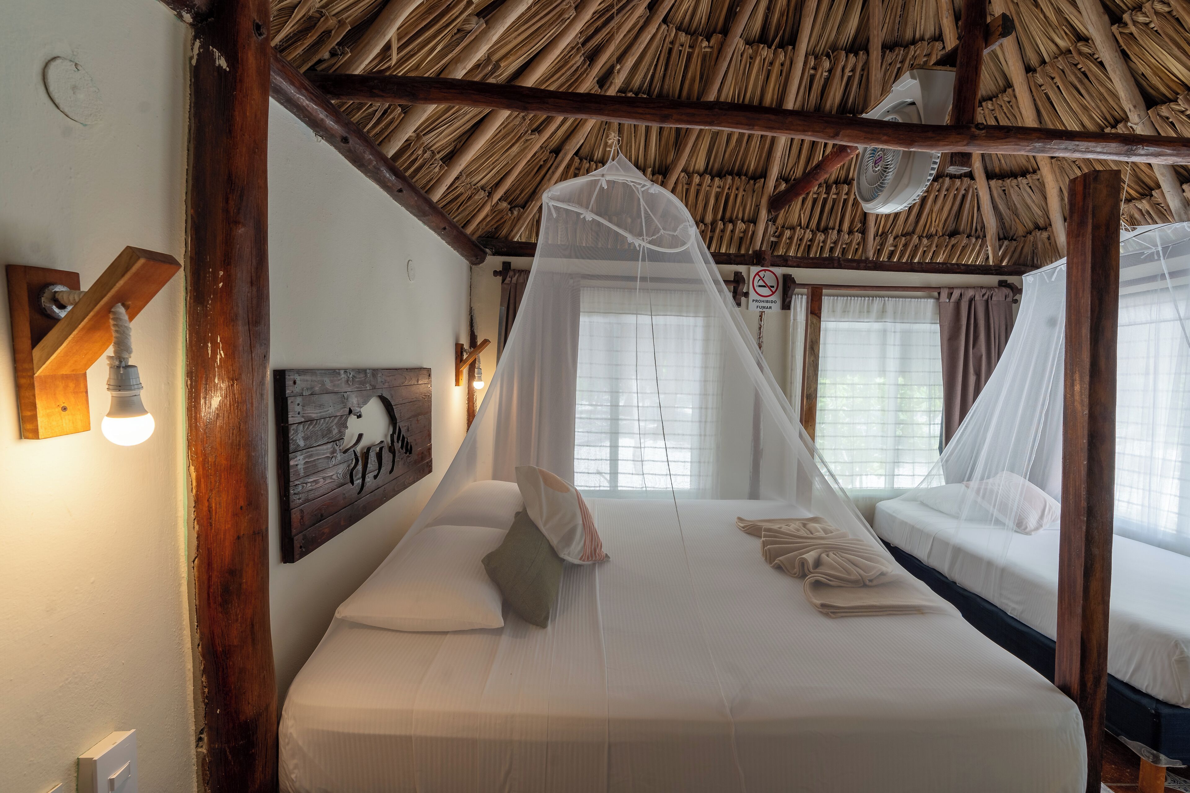 cabin, private bathroom, beach view | bed sheets