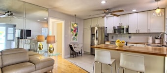 Poolside on first floor with workspace and updated kitchen