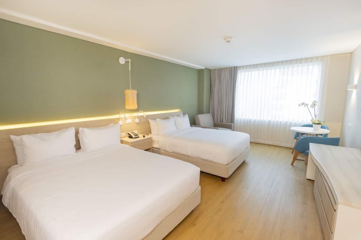 Standaard Twin kamer | Luxe beddengoed, een minibar, een kluis op de kamer, een bureau
