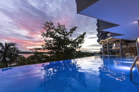 Outdoor pool, open 8:00 AM to 6:00 PM, pool umbrellas, sun loungers