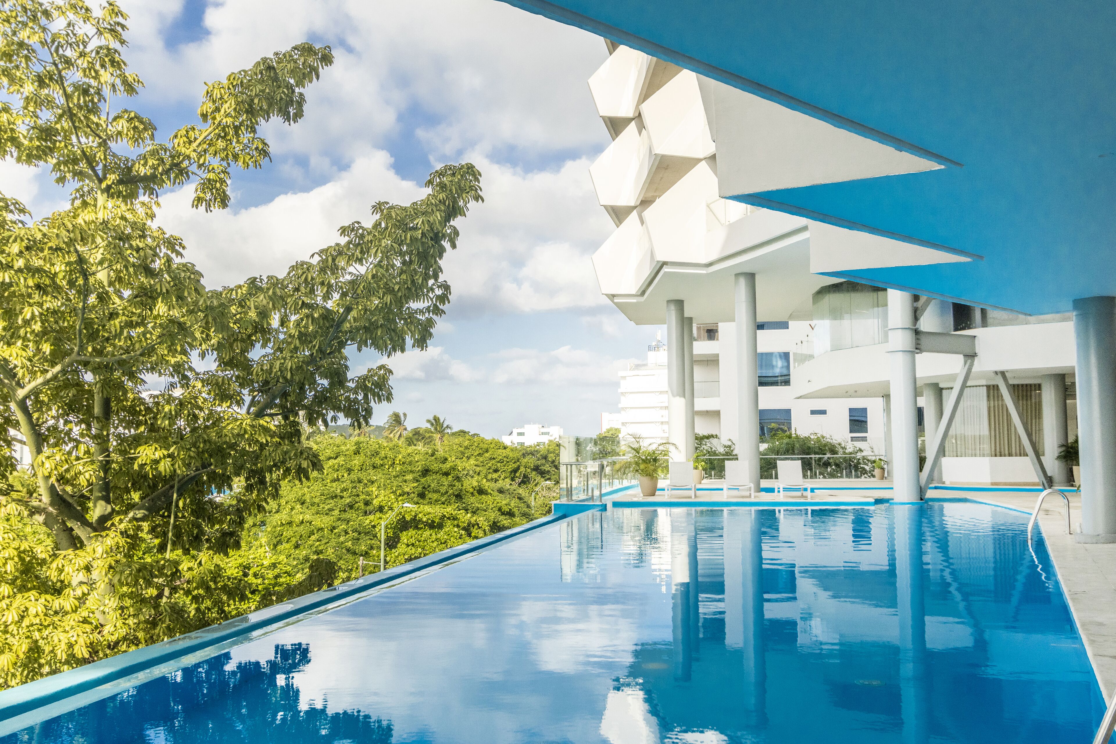 Outdoor pool, open 8:00 AM to 6:00 PM, pool umbrellas, pool loungers