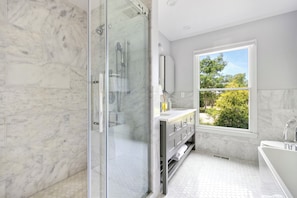 Combined shower/tub, hair dryer, towels, soap