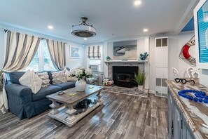 Smart TV, fireplace, books