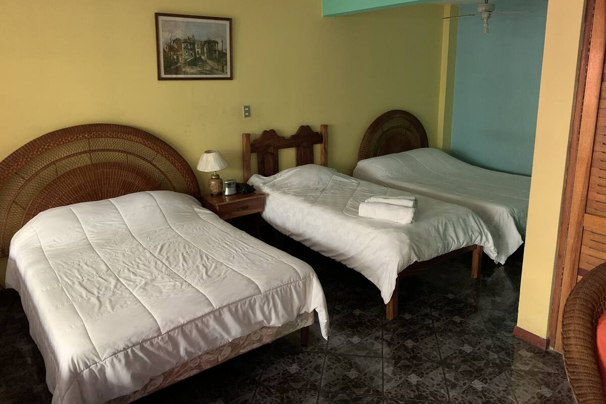 Basic Quadruple Room | In-room safe, free WiFi, bed sheets