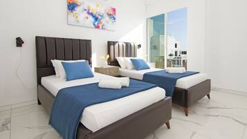 3 habitaciones, tabla de planchar con plancha y acceso a internet