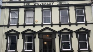 A two-story building with the sign "The Waverley Hotel" above the entrance. - The Waverley Hotel (Whitehaven)