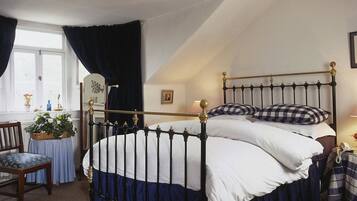 Desk, blackout drapes, iron/ironing board, bed sheets