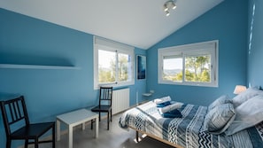 3 bedrooms, iron/ironing board, travel cot, WiFi
