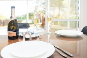 Enjoy a romantic dinner for two with a view of lush greenery.