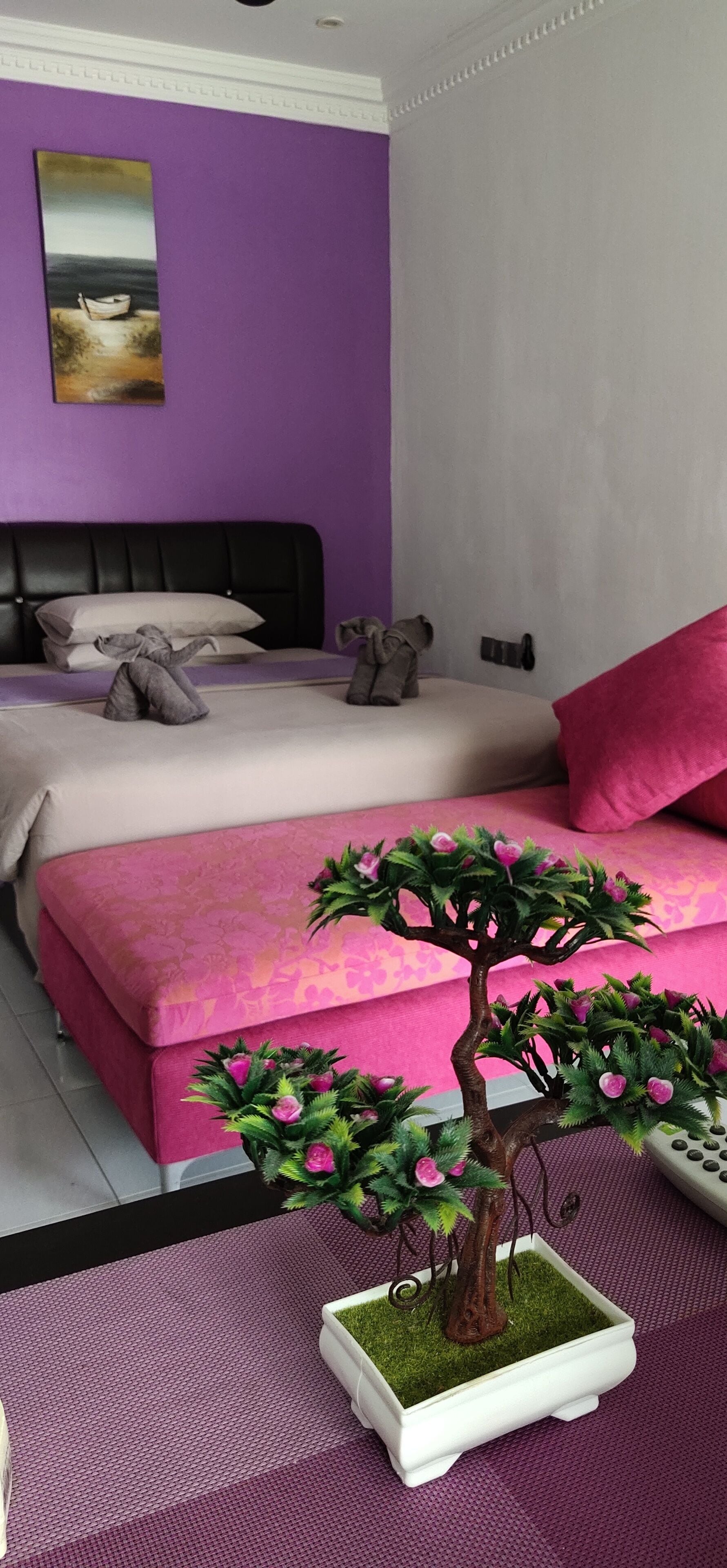 Desk, laptop workspace, blackout drapes, bed sheets