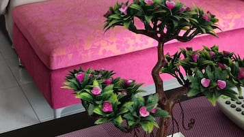 Desk, laptop workspace, blackout drapes, bed sheets