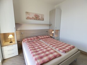 2 habitaciones, cuna de viaje, wifi gratis y ropa de cama 