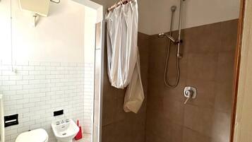 Shower, bidet, towels