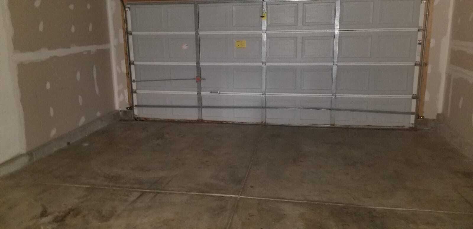 2 car garage with remote and a drive way