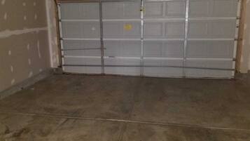 2 car garage with remote and a drive way