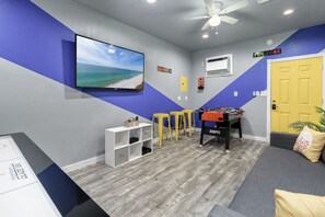Smart TV, video games, DVD player, foosball