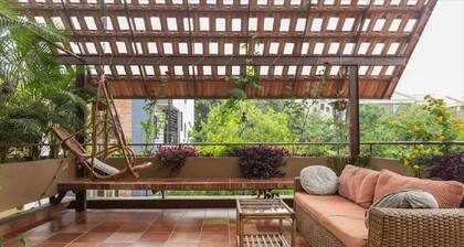 Relax in centrally located quiet terrace floor ensuite room in trendy eco-villa