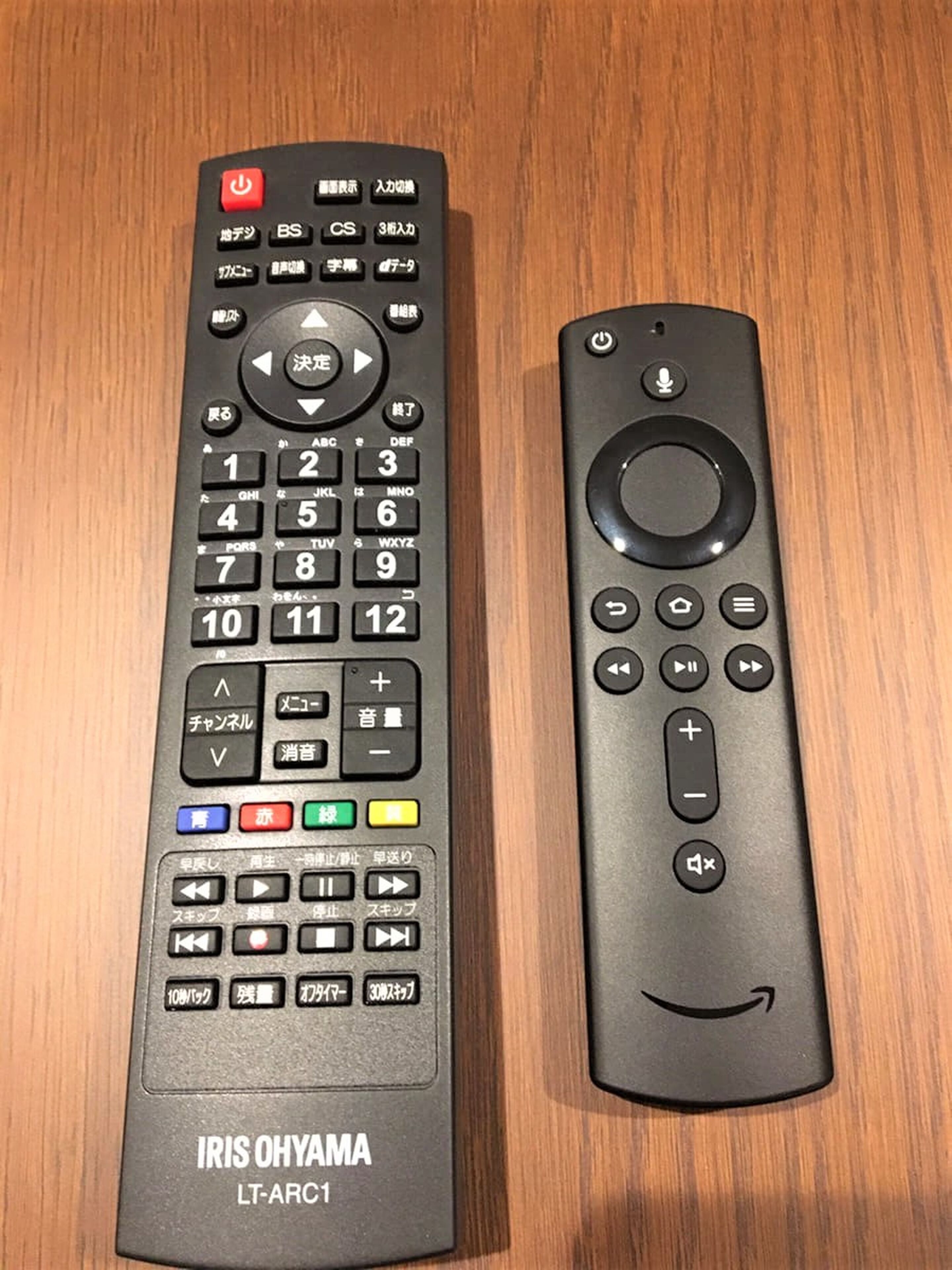 Two remote controls, one labeled "IRIS OHYAMA LT-ARC1" and the other with an Amazon logo.