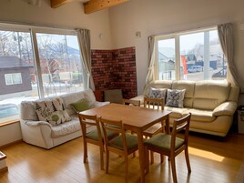 Deluxe Chalet | Living room | TV