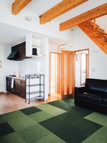 Deluxe Chalet | Living area | TV