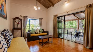 Luxe kamer | Woonruimte | Een 32-inch lcd-televisie met kabelzenders en televisie