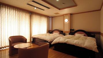 Twin Room, Top Floor | Hypo-allergenic bedding, down comforters, in-room safe, desk