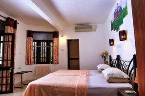 Deluxe Double Room | Minibar, in-room safe, desk, iron/ironing board