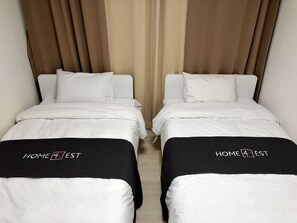 Apartament empresarial, vistes a la ciutat | 3 dormitoris, cortines opaques i planxa i posts de planxar 