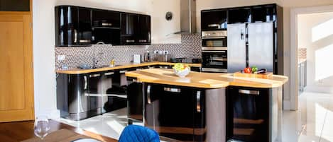 Premium Penthouse | Private kitchen | Full-sized fridge, microwave, oven, stovetop