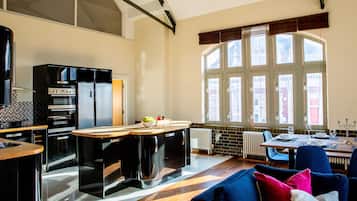 Premium Penthouse | Private kitchen | Full-size fridge, microwave, oven, stovetop