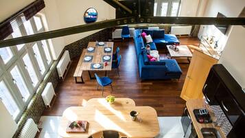 Premium Penthouse | Living area | 50-inch flat-screen TV with digital channels, Smart TV