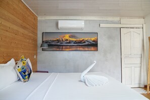 Hypo-allergenic bedding, desk, iron/ironing board, rollaway beds