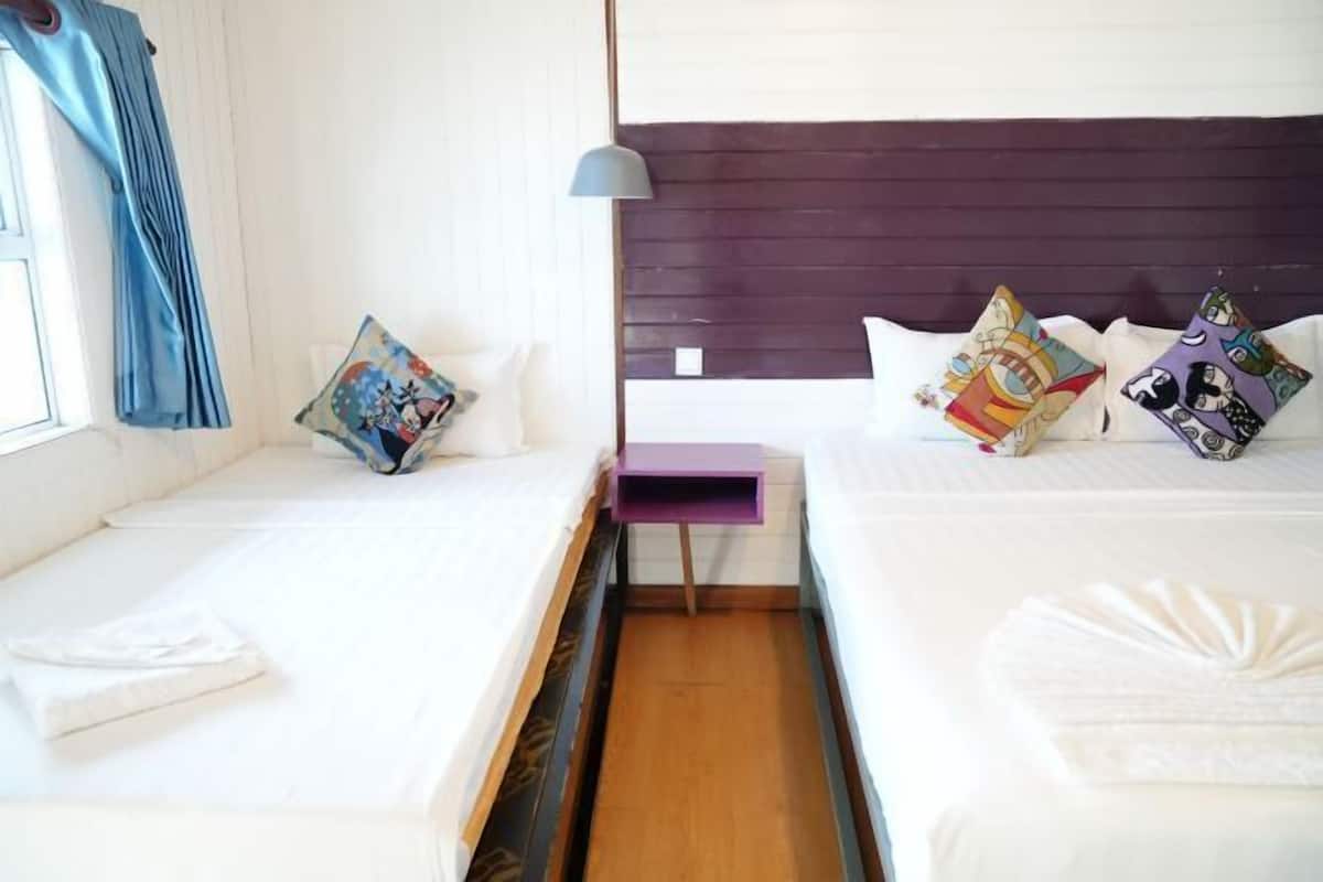 Hypo-allergenic bedding, desk, iron/ironing board, rollaway beds