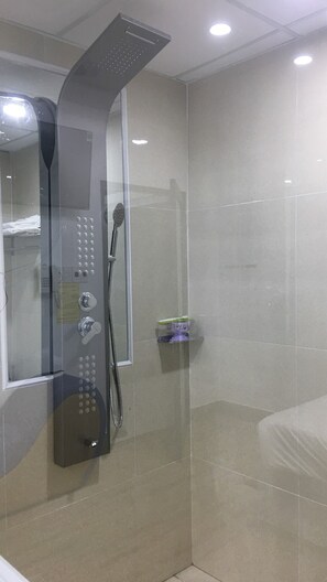 Double Room | Bathroom | Shower, free toiletries, towels