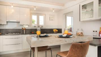 Villa | Private kitchen | Coffee/tea maker, full-size fridge, microwave, oven
