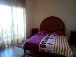 Apartment, 2 Bedrooms | 2 bedrooms, blackout drapes, bed sheets