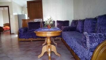 Apartment, 2 Bedrooms | Living room | 32-inch flat-screen TV with satellite channels, TV