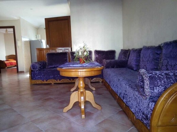 Apartment, 2 Bedrooms | Living room | 32-inch flat-screen TV with satellite channels, TV