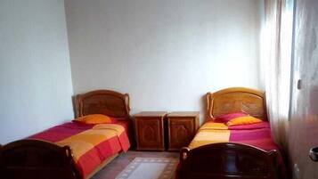 Apartment, 2 Bedrooms | 2 bedrooms, blackout drapes, bed sheets
