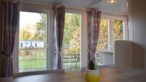 Chalet, 3 Bedrooms | Living area - VDB Holiday - Recreatiepark de Voorst (Kraggenburg)