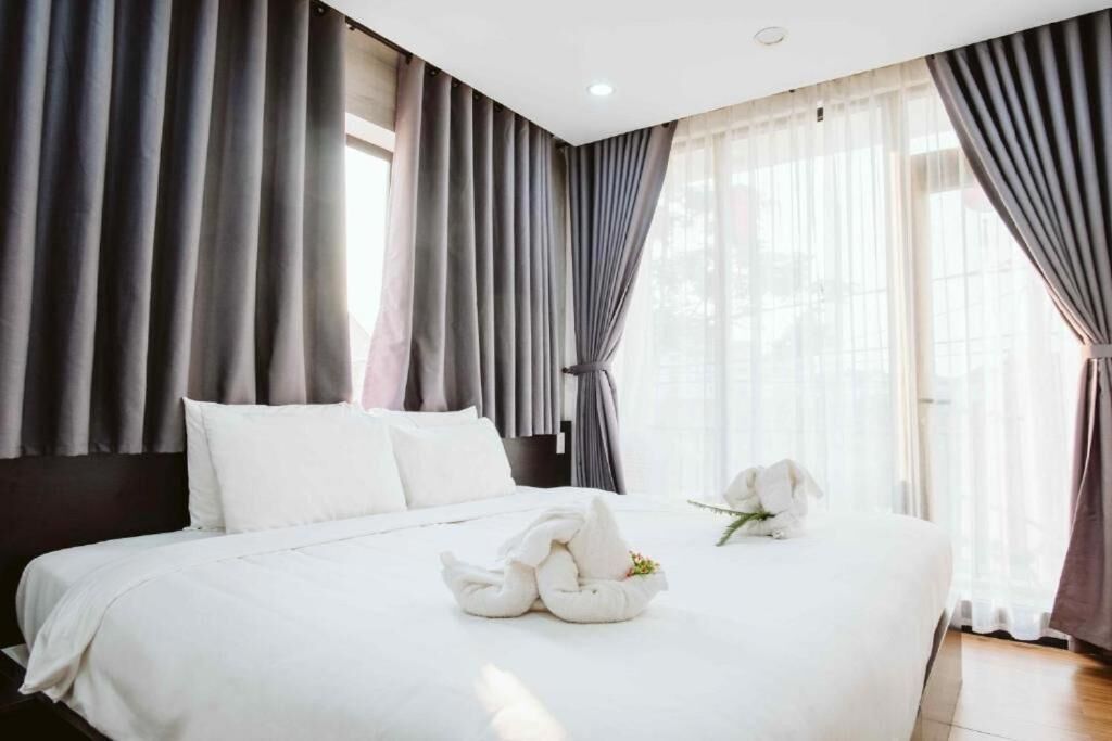 Neljän hengen perhehuone | Ylelliset vuodevaatteet, minibaari, ilmainen Wi-Fi