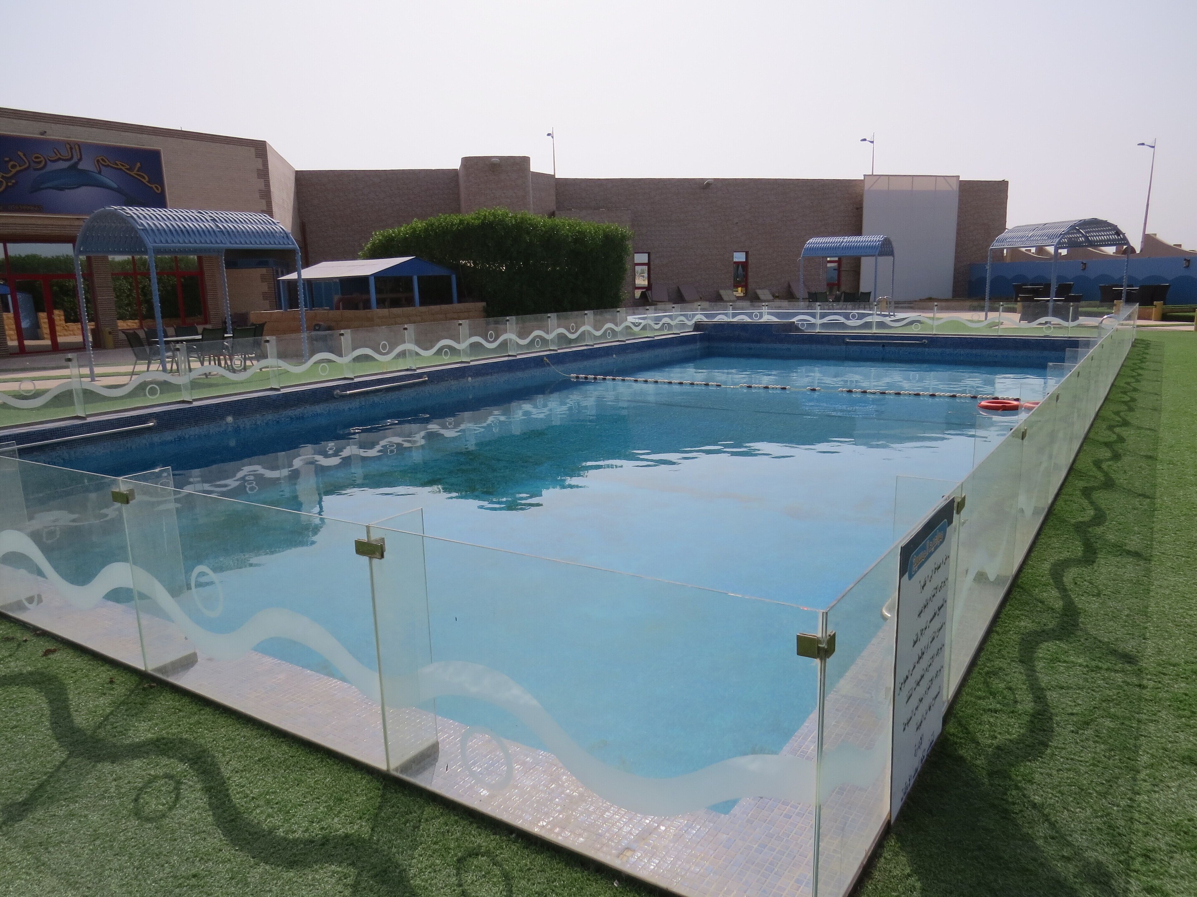 Outdoor pool, open 7:00 AM to 5:00 PM, free pool cabanas, pool umbrellas