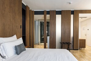 Suite | Ropa de cama de alta calidad y artículos del minibar gratis