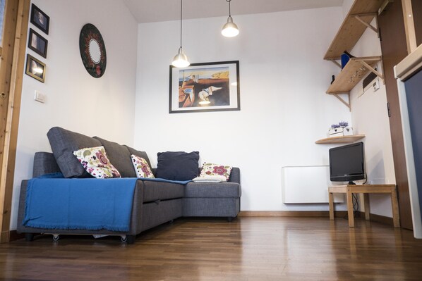 Departamento, 1 habitación | Área de sala de estar
