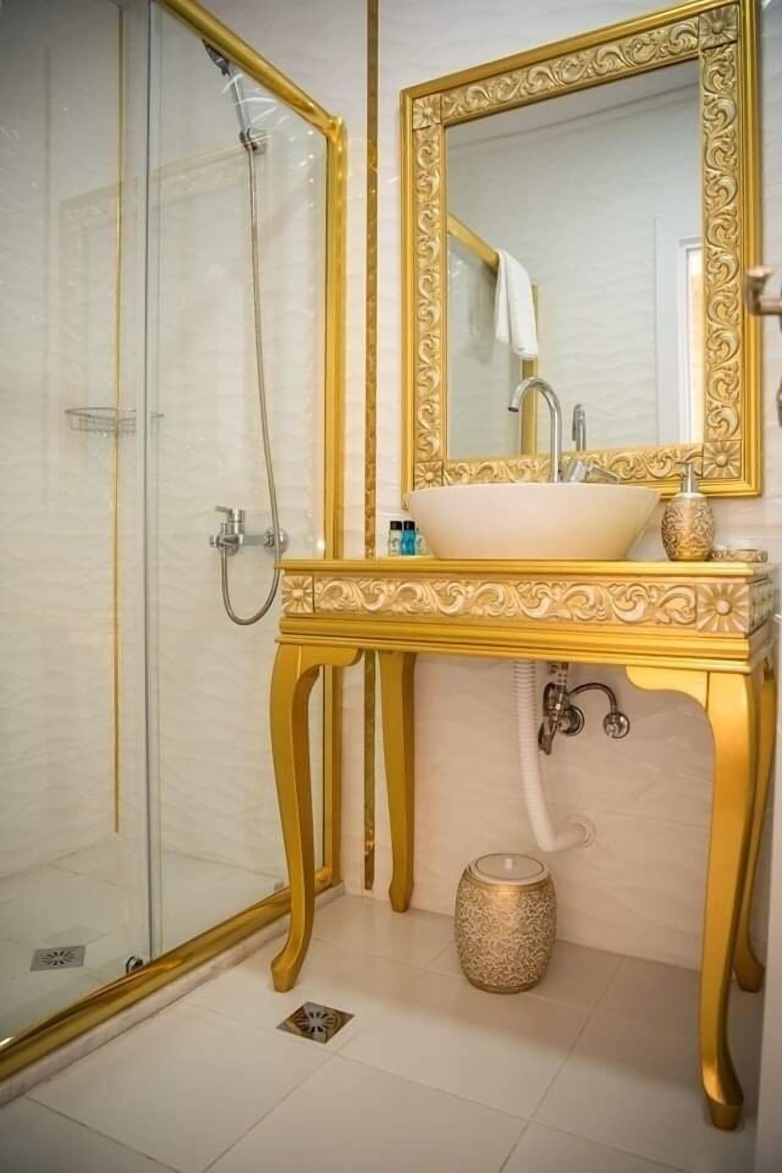 Shower, hair dryer, bathrobes, slippers