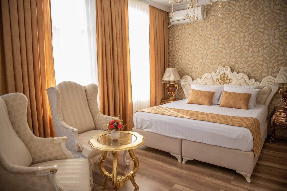Luxe tweepersoonskamer | Een strijkplank/strijkijzer, gratis babybedden, gratis wifi, beddengoed